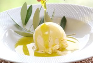 A single scoop of vanilla bean olive oil ice cream