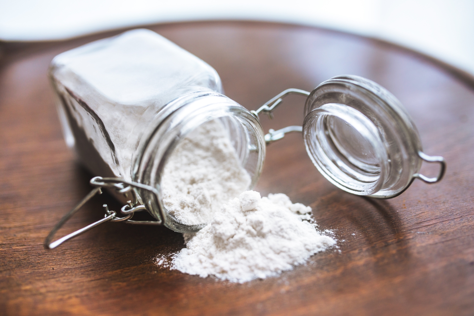 A jar of corn-free baking powder made from cream of tartar, baking soda and arrowroot powder