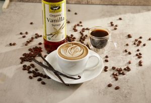 A vanilla latte made with organic vanilla syrup from Singing Dog Vanilla